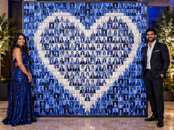 Guest photo tiles forming a heart on a large event mosaic wall